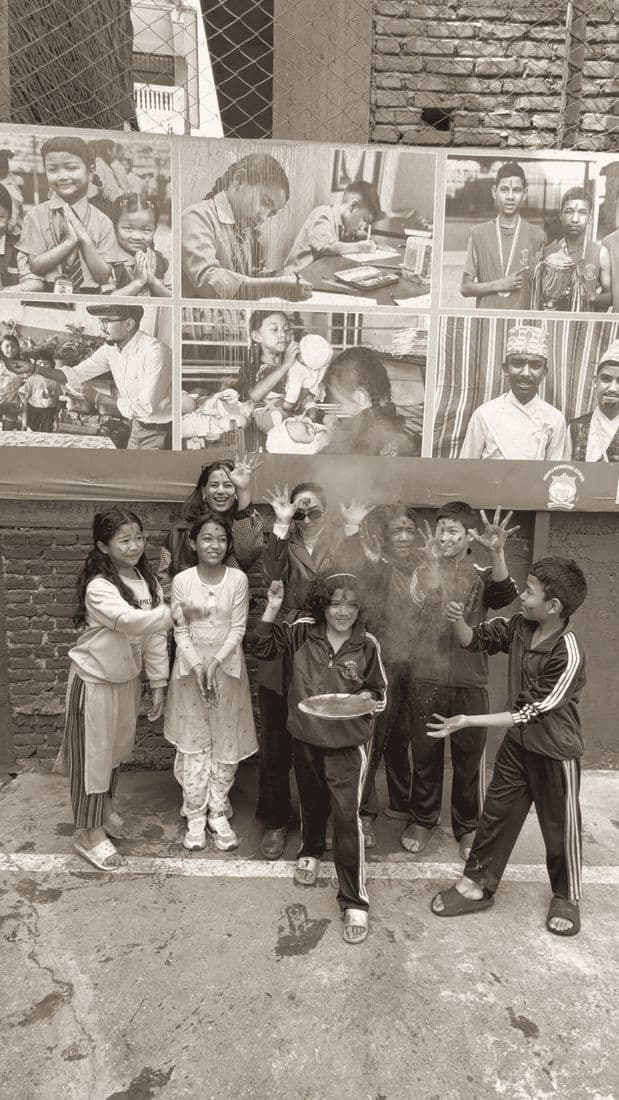 Children celebrating with colour powder